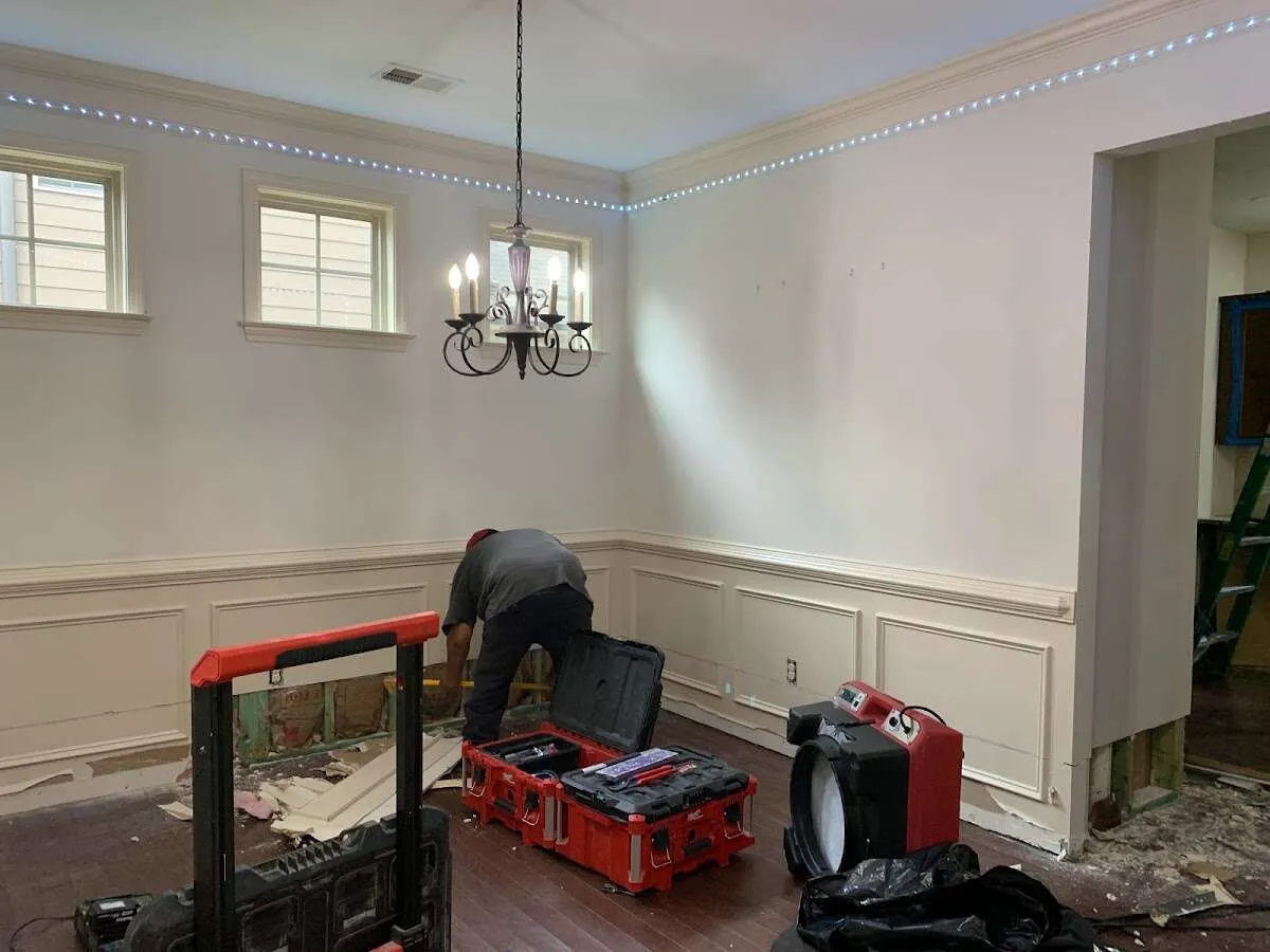 Restoration technician with professional equipment in Manasquan